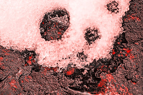 Ice Skull Snow Face Melting Atop Rock (Red Tone Photo)