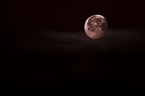 Moon Sets Behind Faint Clouds (Red Tone Photo)
