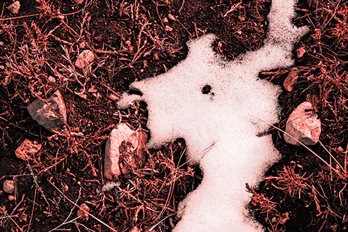 Peering Humanoid Snow Face Creature Among Rocks (Red Tone Photo)