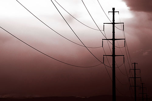 Powerlines Receding Into Thunderstorm (Red Tone Photo)