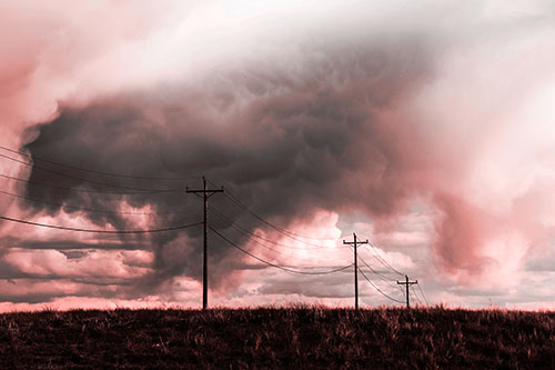 Rainstorm Clouds Twirl Beyond Powerlines (Red Tone)