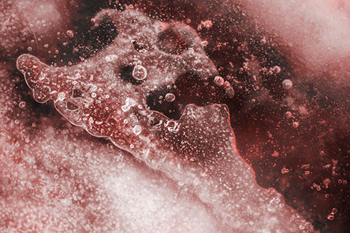 Screaming Submerged Bubble Face Creature Among Icy River (Red Tone)