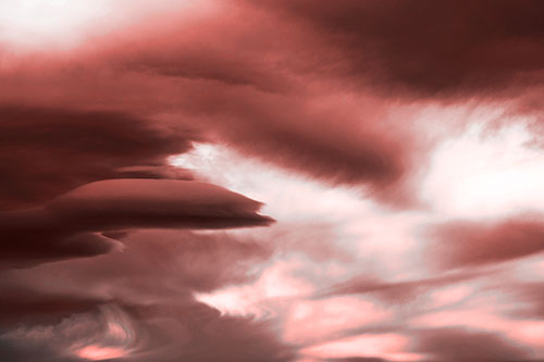 Smooth Cloud Sails Along Swirling Formations (Red Tone Photo)