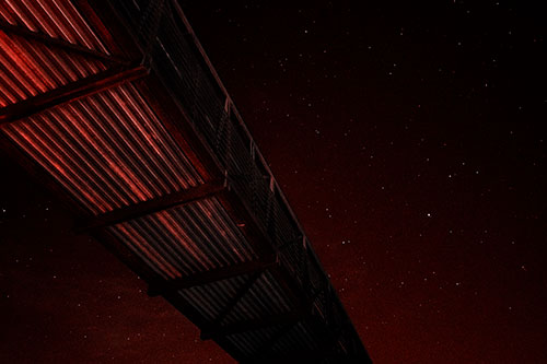 Stars Shining Above Walkway Bridge (Red Tone Photo)