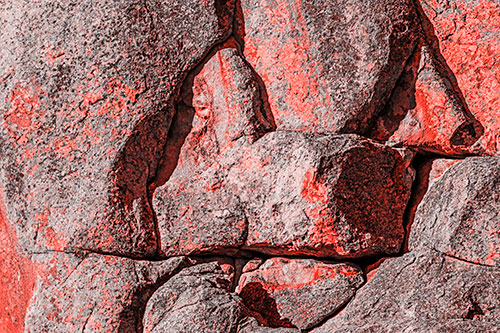 Stone Sphinx Within Rock Formation (Red Tone Photo)