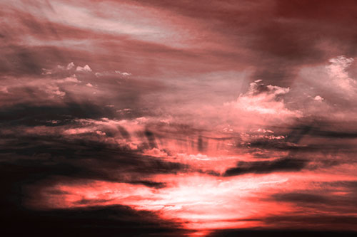 Sunrise Bursting Colorful Light Past Clouds (Red Tone Photo)