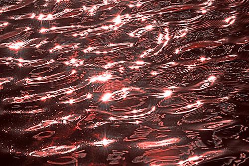 Water Ripples Sparkling Among Sunlight (Red Tone Photo)