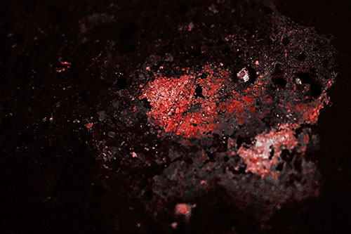 Wide Eyed Oil Demon Face Floating Atop Water (Red Tone)