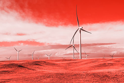 Wind Turbine Cluster Overtaking Hilly Horizon (Red Tone Photo)