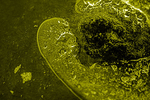 Angry Eyebrow Raised Ice Bubble Creature Bending Beside Mossy Rock (Yellow Shade)