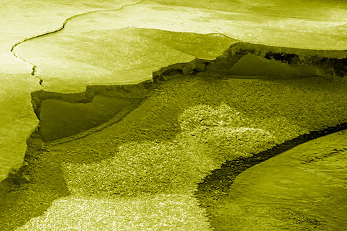 Cracked Ice Frozen Shoreline Melting (Yellow Shade Photo)