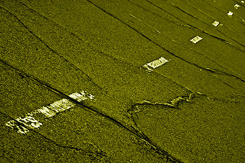 Decomposing Pavement Markings Along Sidewalk (Yellow Shade Photo)