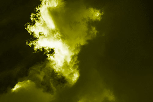 Evil Cloud Face Snarls Among Sky (Yellow Shade Photo)