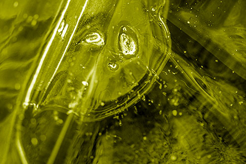 Frozen Unhappy Frowning Distorted River Ice Face (Yellow Shade Photo)