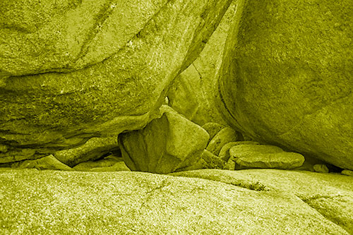 Large Crowded Boulders Leaning Against One Another (Yellow Shade Photo)