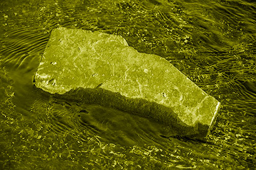Massive Rock Atop Riverbed (Yellow Shade Photo)