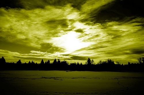Sun Vortex Illuminates Clouds Above Dark Lit Lake (Yellow Shade Photo)