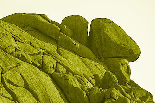 Sunlight Casting Shadows On Mountain Of Rocks (Yellow Shade)