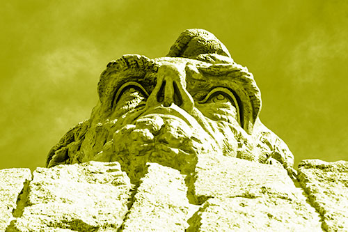 Vertical Upwards View Of Presidents Statue Head (Yellow Shade Photo)