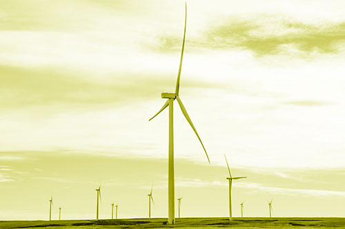 Wind Turbine Cluster Standing Tall Among Horizon (Yellow Shade)