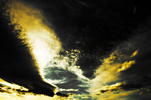 Curving Black Charred Sunset Clouds (Yellow Tint Photo)