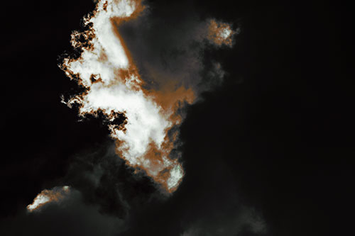 Evil Cloud Face Snarls Among Sky (Yellow Tint Photo)