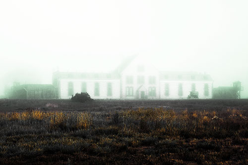 Fog Engulfs Historic State Penitentiary (Yellow Tint Photo)
