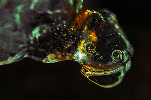 Joyful Frozen Bubble Eyed River Ice Face Creature (Yellow Tint Photo)