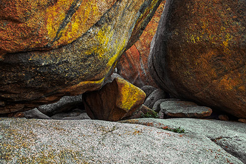 Large Crowded Boulders Leaning Against One Another (Yellow Tint)