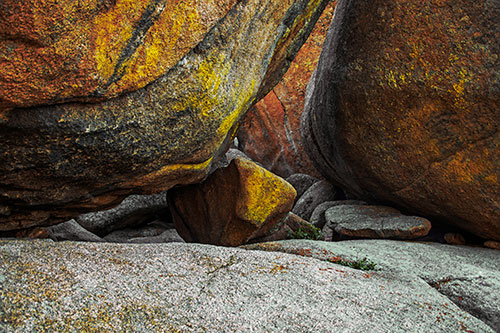 Large Crowded Boulders Leaning Against One Another (Yellow Tint Photo)