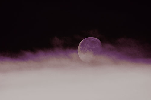 Moon Rolling Along Clouds (Yellow Tint Photo)