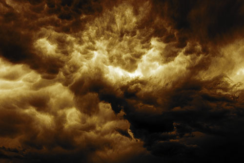 Raging Thunderstorm Clouds Brewing Among Sky (Yellow Tint)