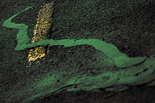 Slithering Tar Creeps Over Pavement Marking (Yellow Tint Photo)