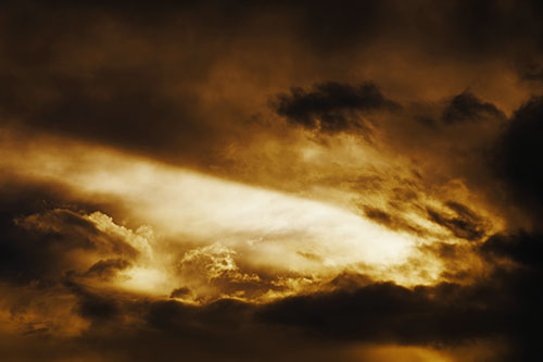 White Light Tearing Through Clouds (Yellow Tint Photo)