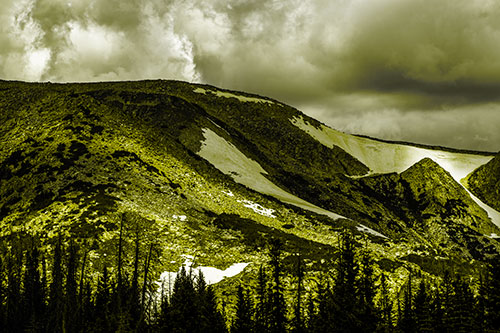 Clouds Cover Melted Snowy Mountain Range (Yellow Tone Photo)