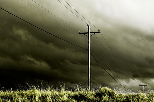 Dark Thunderstorm Clouds Over Powerline (Yellow Tone Photo)
