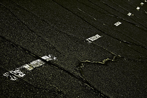 Decomposing Pavement Markings Along Sidewalk (Yellow Tone Photo)