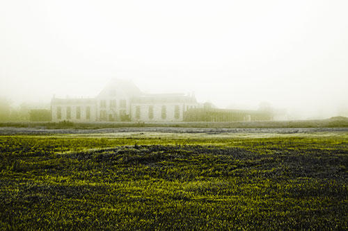 Dense Fog Consumes Distant Historic State Penitentiary (Yellow Tone Photo)