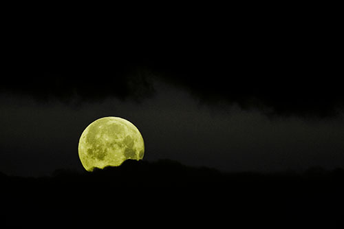 Easter Morning Moon Peeking Through Clouds (Yellow Tone Photo)