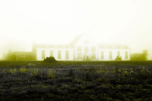 Fog Engulfs Historic State Penitentiary (Yellow Tone Photo)