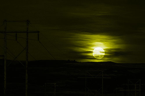 Full Moonrise Behind Mountain (Yellow Tone Photo)