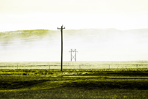 Heavy Fog Hiding Mountain Range Behind Powerlines (Yellow Tone Photo)