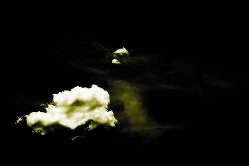 Isolated Creature Head Cloud Appears Within Darkness (Yellow Tone Photo)