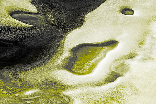 Joyful Ice Face Frozen Atop River (Yellow Tone)