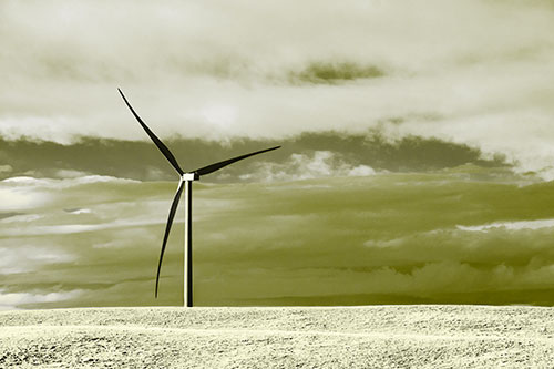 Lone Wind Turbine Standing Along Dry Prairie Horizon (Yellow Tone Photo)