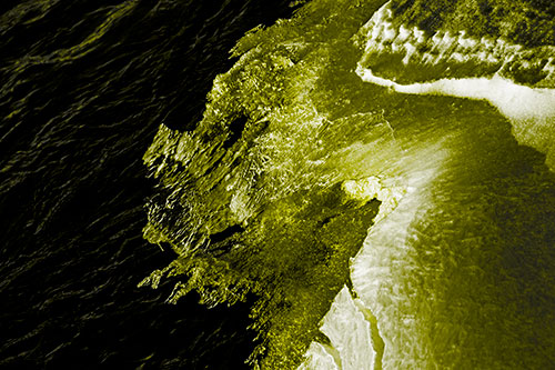 Melting Ice Face Creature Atop River Water (Yellow Tone)