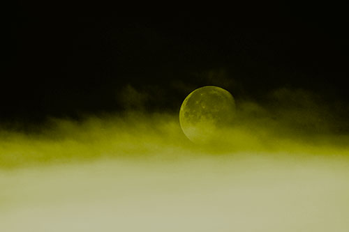Moon Rolling Along Clouds (Yellow Tone Photo)