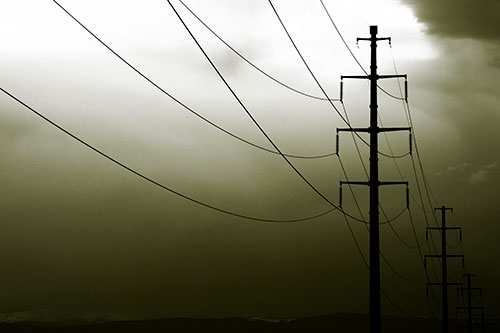 Powerlines Receding Into Thunderstorm (Yellow Tone Photo)