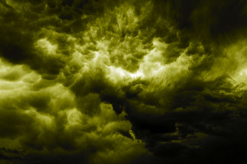 Raging Thunderstorm Clouds Brewing Among Sky (Yellow Tone)