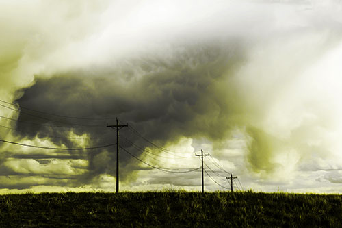 Rainstorm Clouds Twirl Beyond Powerlines (Yellow Tone Photo)